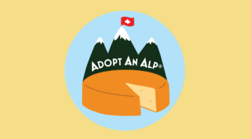 Adopt an Alp logo against yellow background